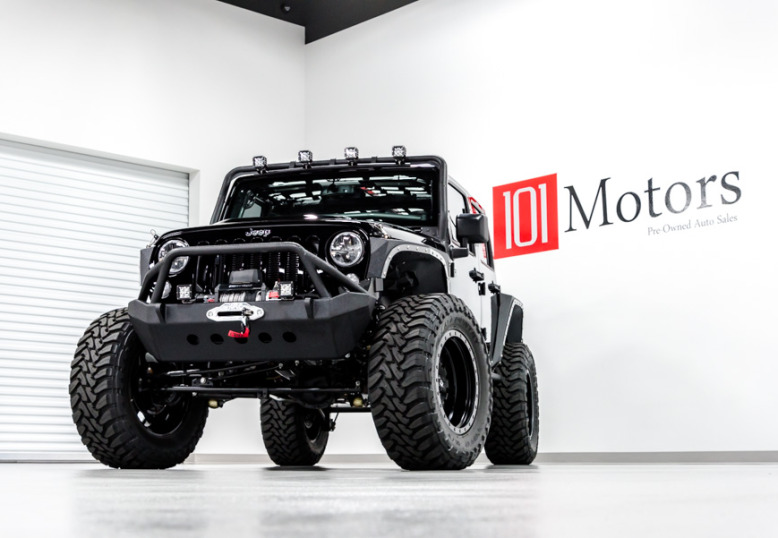 2014 Jeep Wrangler Black with custom roll cage